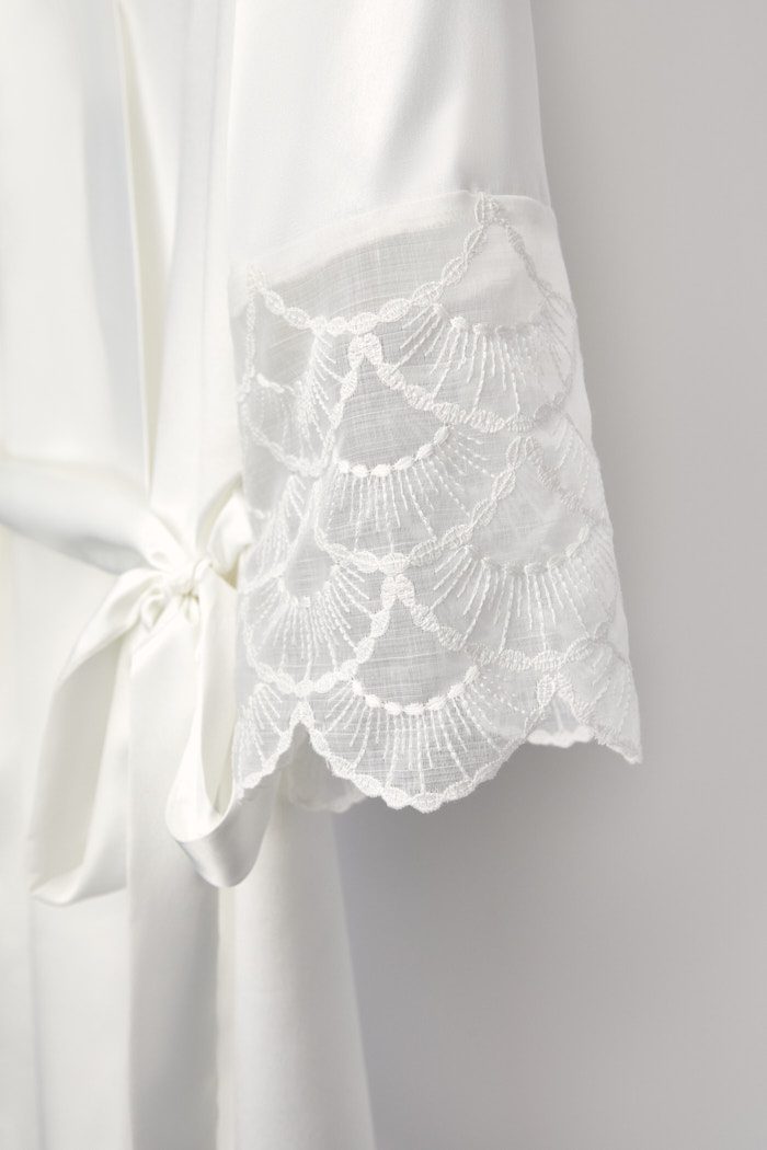 Lace cuff and satin sash of the Lola bridal robe