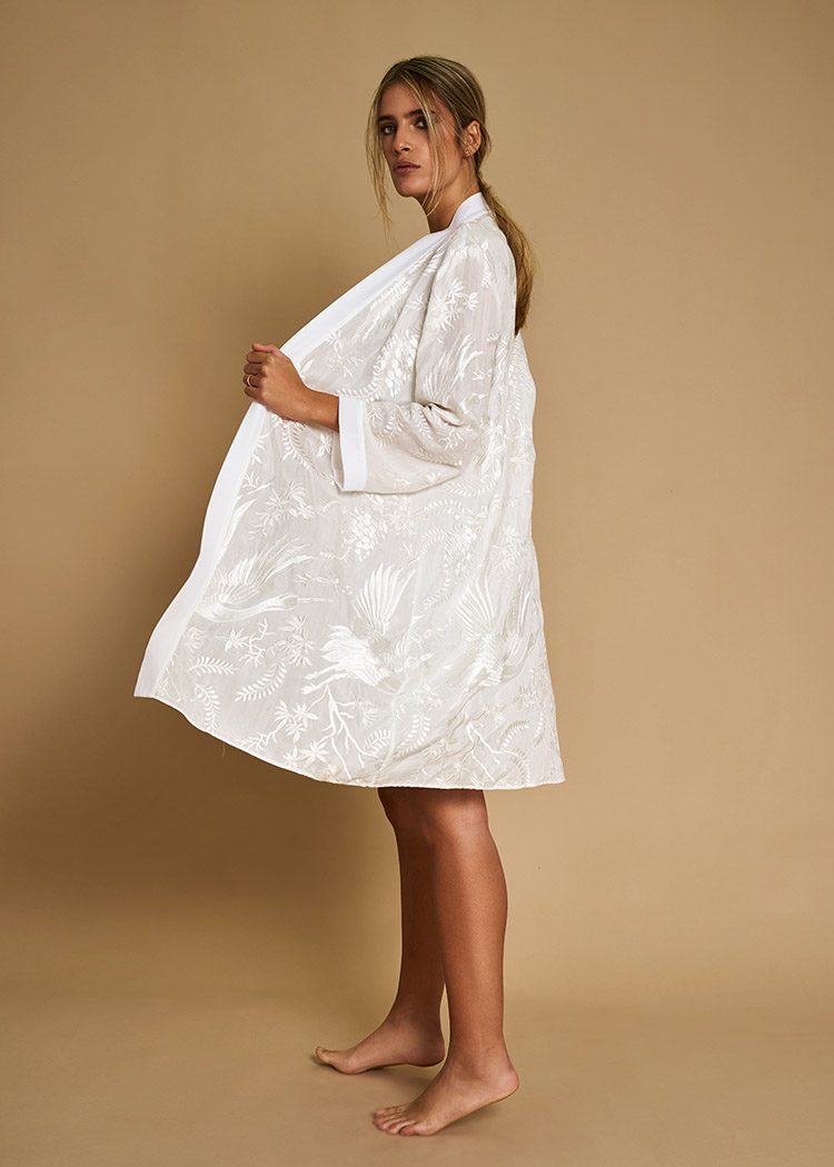 Manila bridal robe held open to show its bird embroidery
