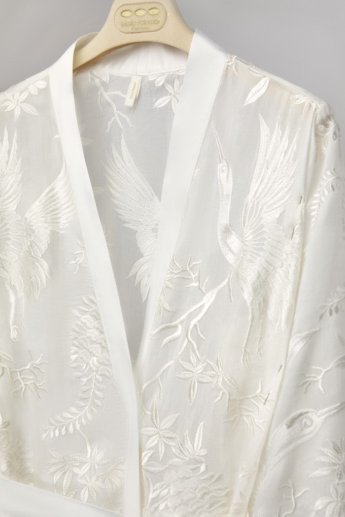 Close-up of the exotic bird embroidery on the Manila bridal robe