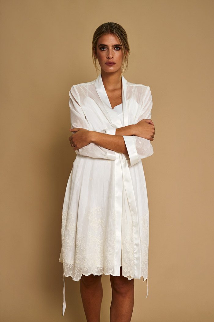 Alma bridal robe closed, front view, with satin trim and embroidered hem
