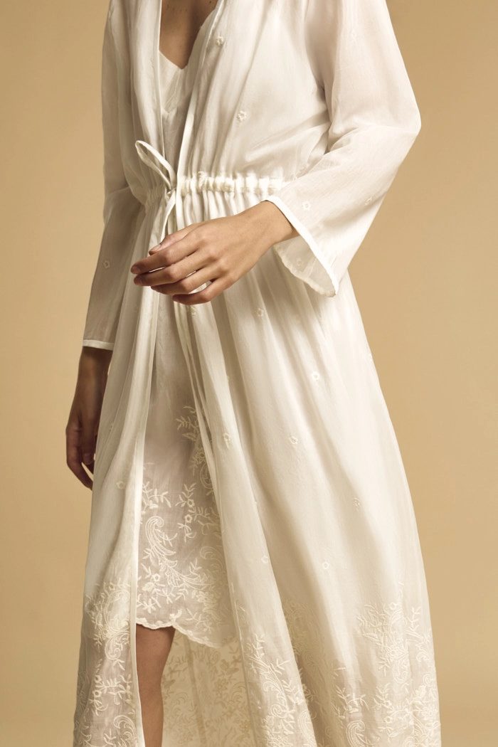 Sleeve and skirt of the silk bridal robe